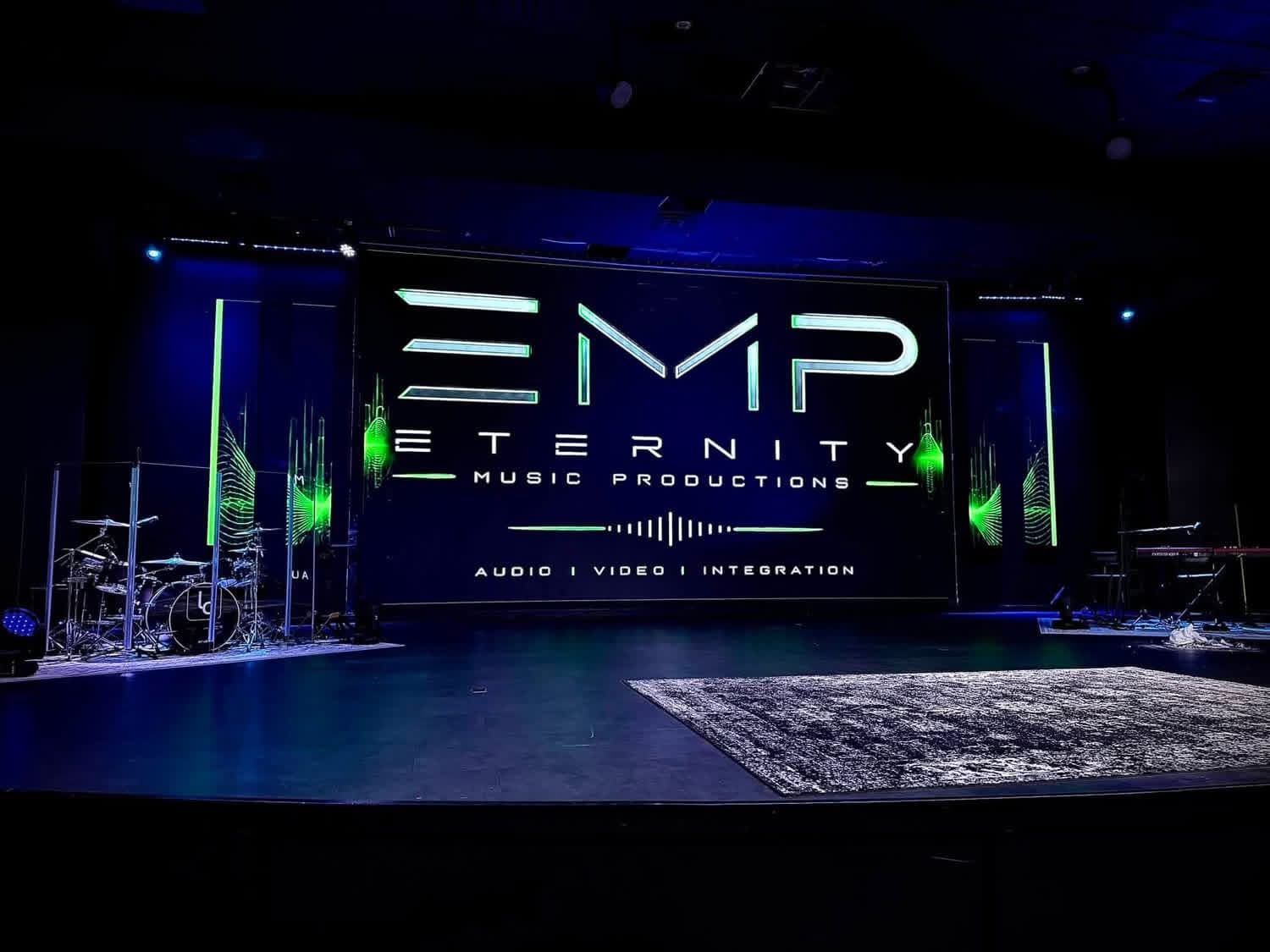 Finished 26 by 13 foot LEDGEN video wall at Life Church in Danville, Illinois, displaying the Eternity Music Productions logo